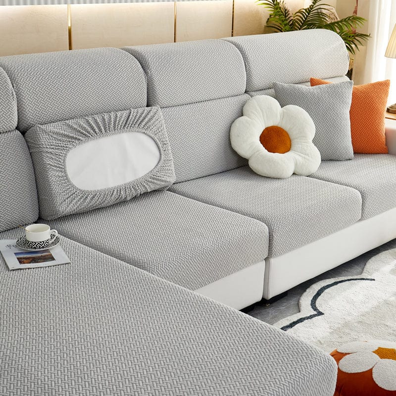 Housse polaire grise, vue latérale sur coussin
