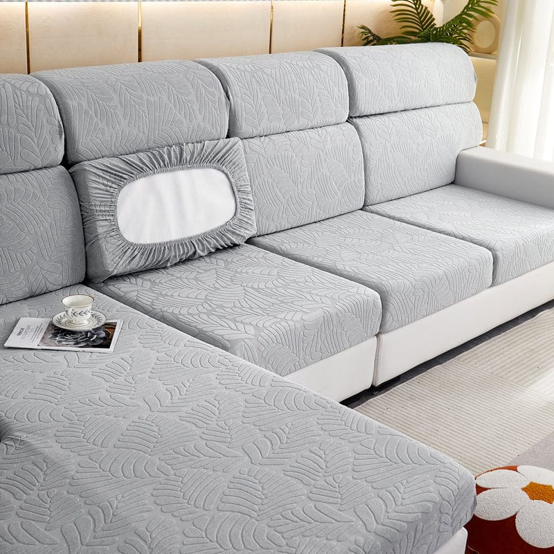 Housse extensible ajustée sur un coussin de canapé