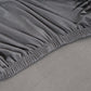 Housse de coussin montrant l'ajustement parfait sur canapé