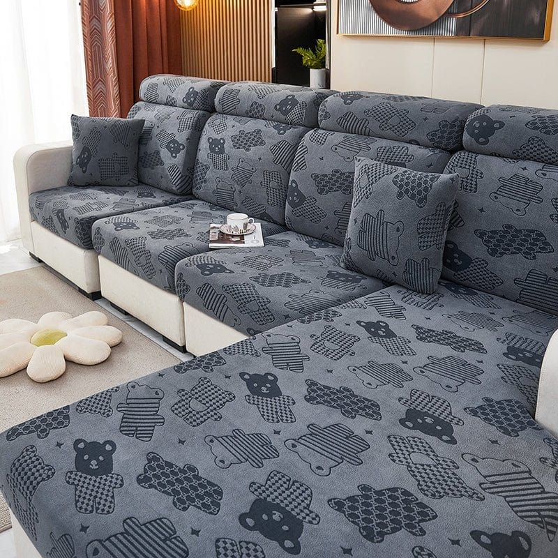 Gros plan sur la texture moelleuse de la housse polaire grise