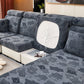 Détail de la matière polaire grise sur coussin de canapé