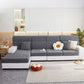 Housse grise avec motifs, ajustée sur coussin de canapé