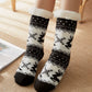Chaussettes noires et blanches avec motifs hivernaux