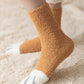 Chaussettes laine blanches et orange avec motif patte de chat