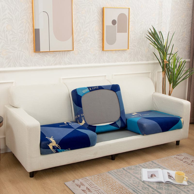 Housse extensible avec motifs floraux sur canapé gris