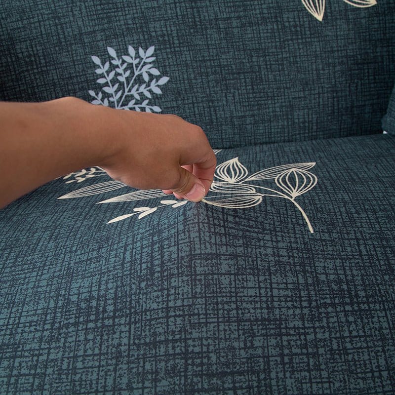 Housse de canapé extensible ajustée sur un canapé d'angle