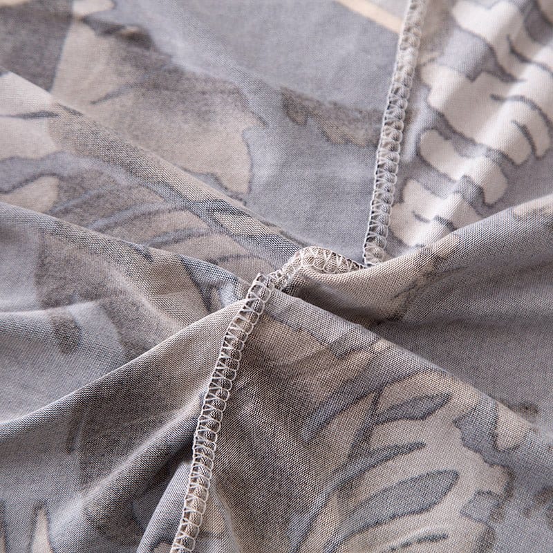 Housse de canapé en jacquard couvrant un fauteuil