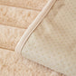 Housse de canapé beige, mise en situation dans un salon