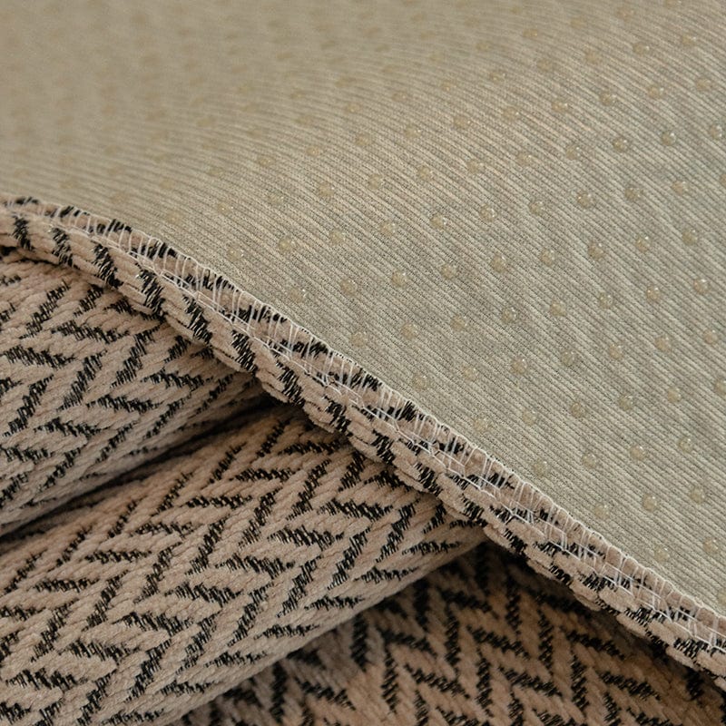 Détail du tissu chevron antidérapant sur le canapé