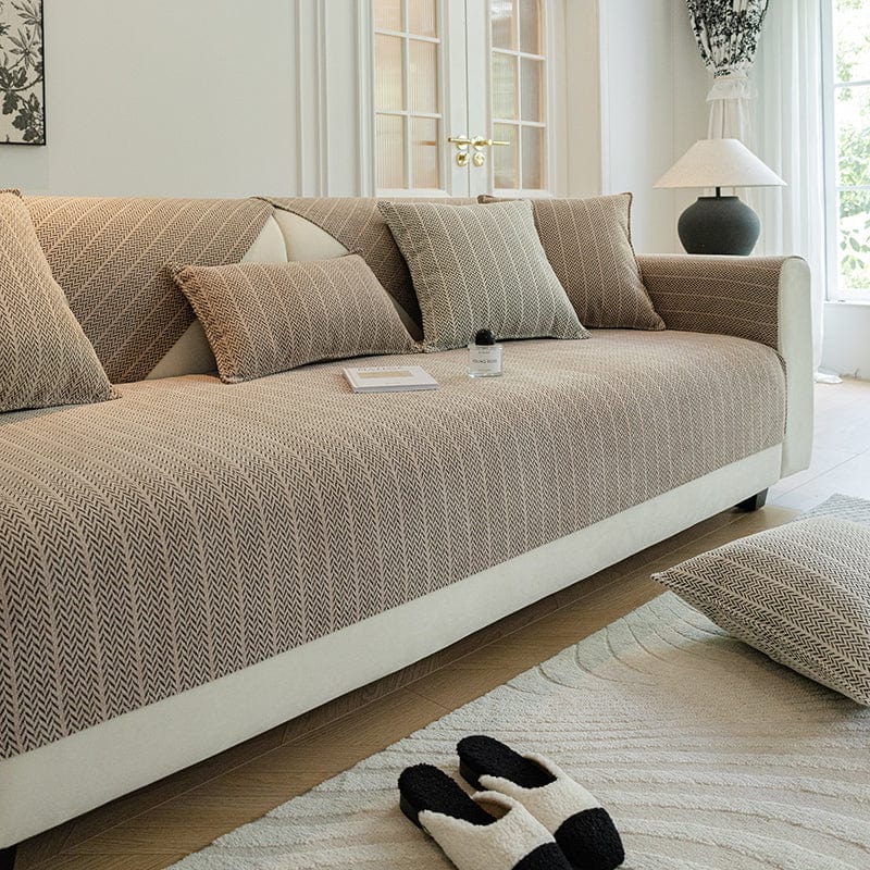 Housse de canapé taupe avec texture herringbone élégante