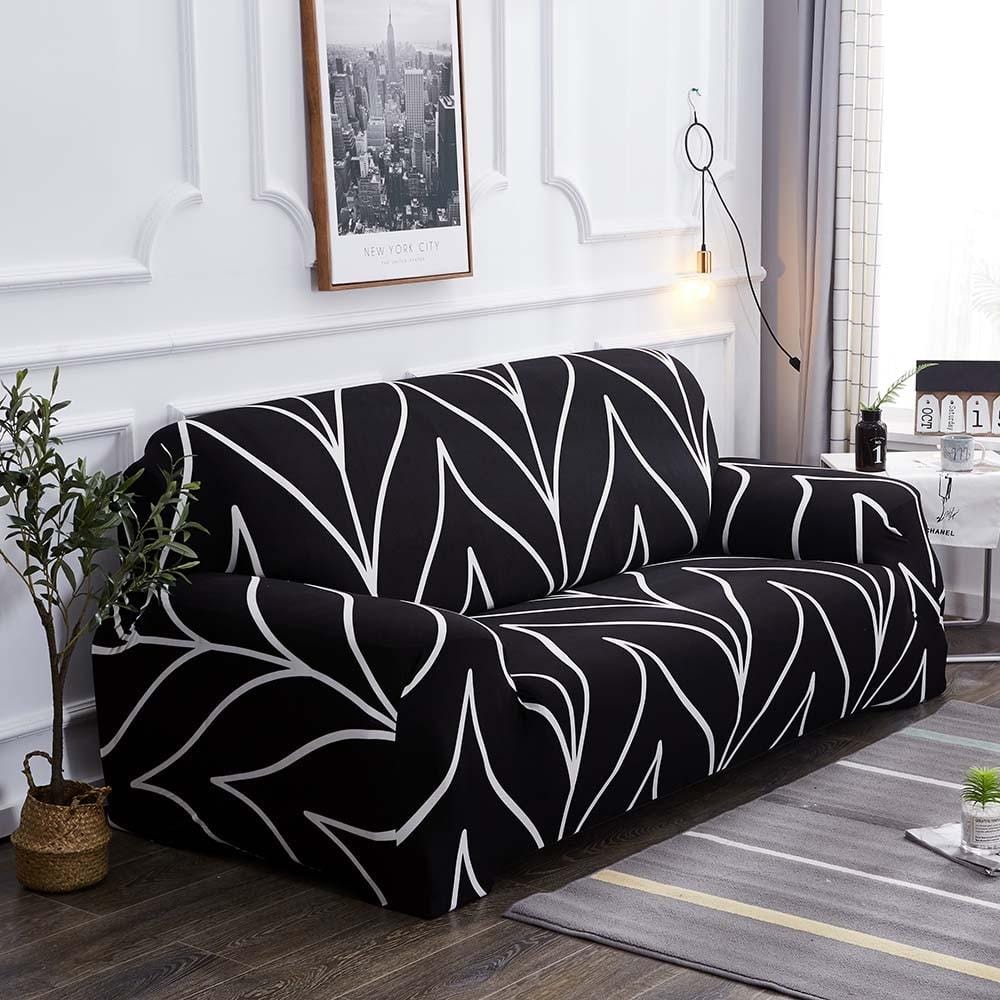 Détail du tissu extensible noir à motifs feuilles