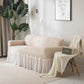Housse extensible blanche sur canapé droit, vue de face