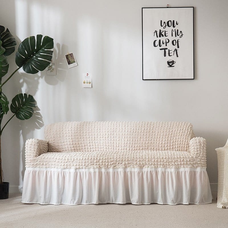 Housse extensible couvrant un canapé, vue d'ensemble