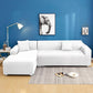 Housse de canapé blanche extensible sur un canapé droit