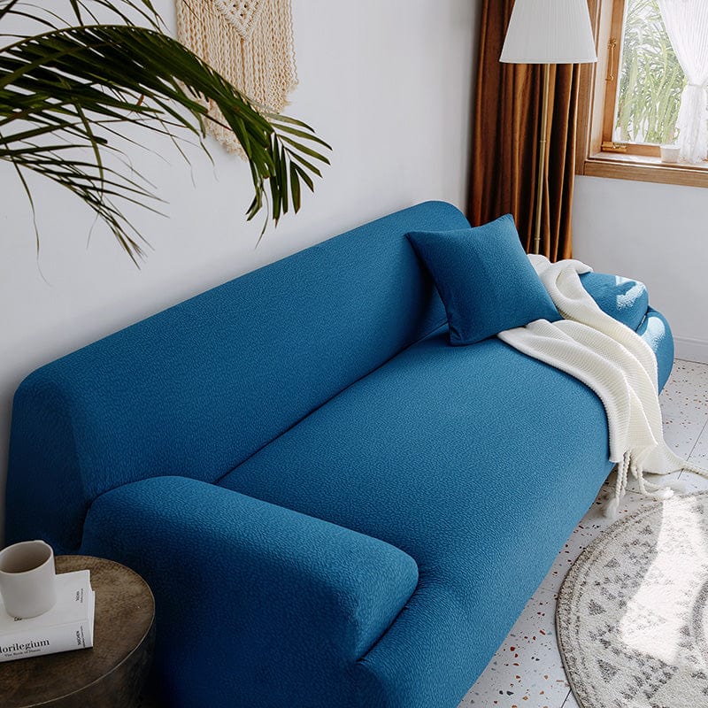 Zoom sur le tissu déperlant bleu du canapé
