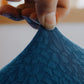 Housse de canapé bleue en jacquard, vue de face