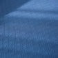 Zoom sur les coutures renforcées de la housse bleue
