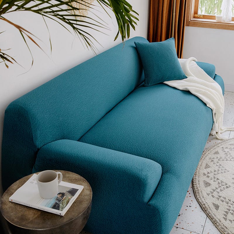 Housse extensible ajustée sur un canapé droit