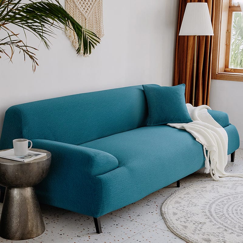 Housse de canapé bleu turquoise en jacquard déperlant