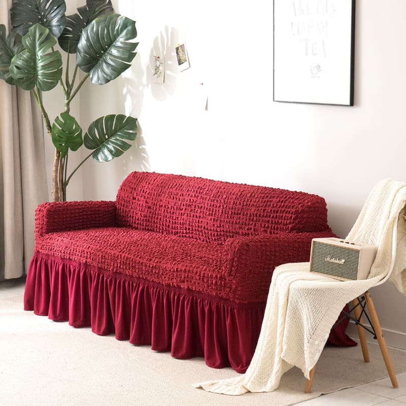 Housse bordeaux extensible sur canapé droit, vue de face