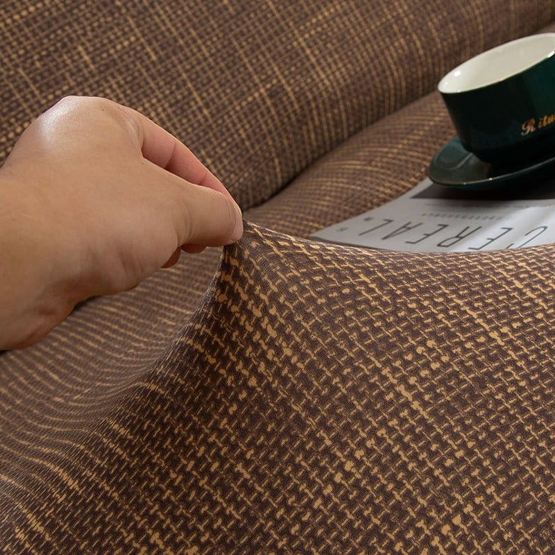 Housse extensible rouge sur canapé droit, vue de face
