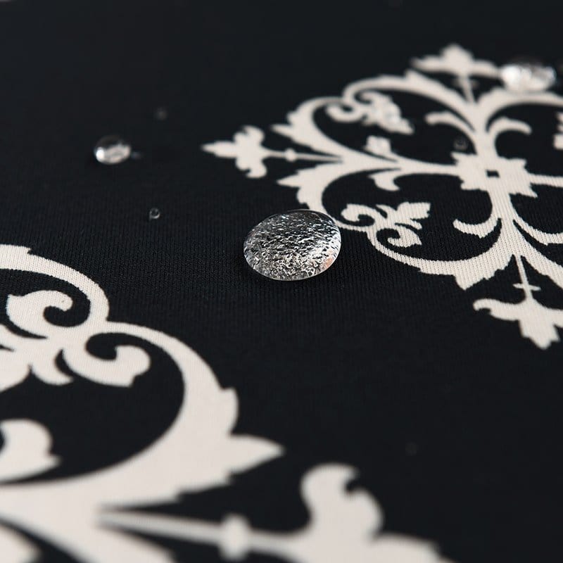 Housse de canapé grise en jacquard extensible sur un canapé droit