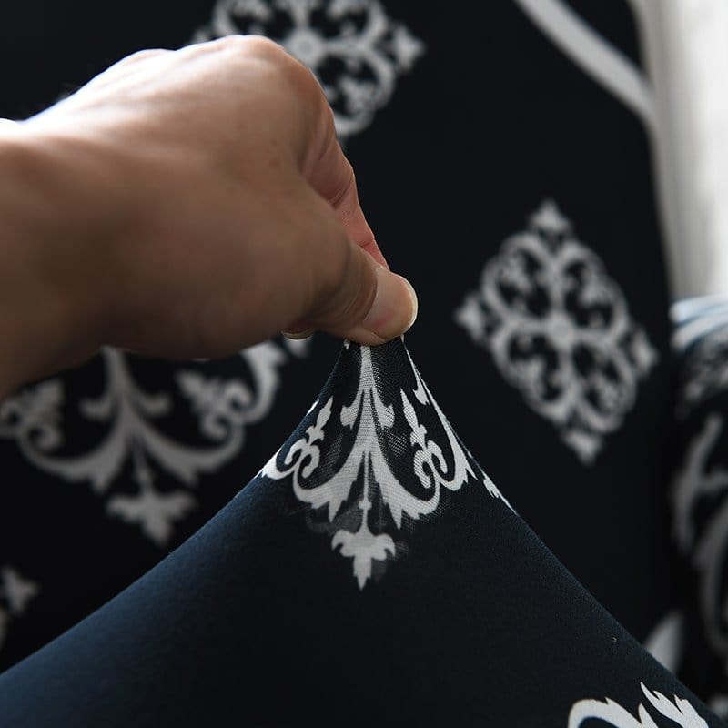 Zoom sur la texture jacquard déperlante de la housse de canapé