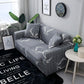 Housse extensible grise sur canapé d'angle moderne