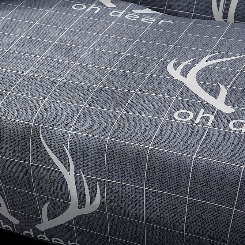Zoom sur tissu extensible gris, texture douce visible