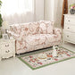 Housse extensible grise sur canapé droit, ajustement parfait