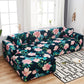 Housse extensible grise sur canapé droit moderne