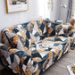 Housse extensible sur canapé droit avec motif géométrique