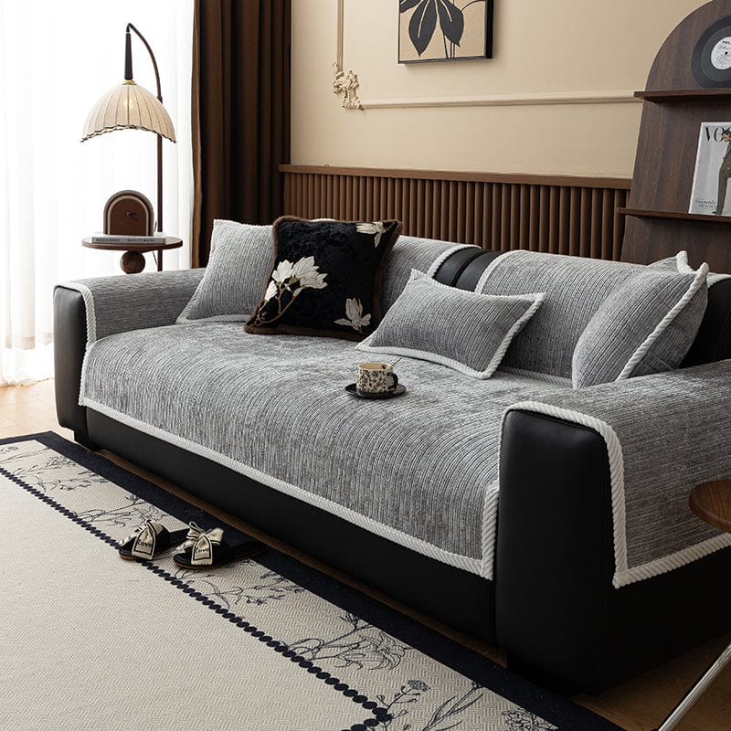 Housse de canapé gris clair en tissu chenillé côtelé