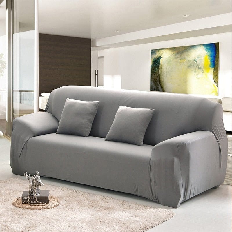 Housse extensible installée sur un canapé d'angle