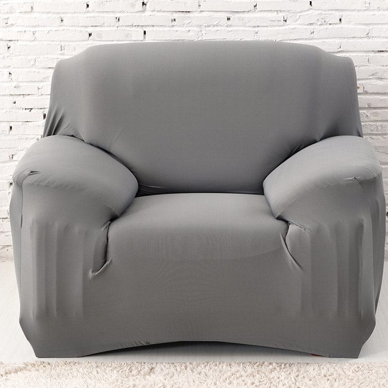 Housse grise couvrant un canapé panoramique