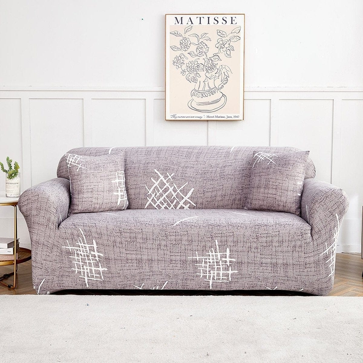 Vue de dessus de la housse grise sur un canapé