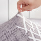 Zoom sur le tissu extensible gris de la housse