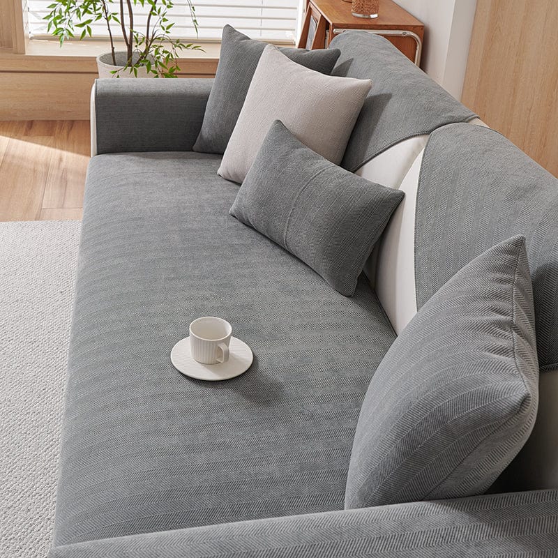 Détail du tissu chenillé gris avec texture douce et antidérapante