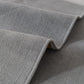 Texture veloutée du tissu chenillé italien sur une housse de canapé