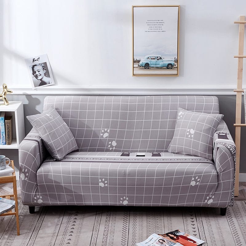 Housse extensible grise, ajustement parfait sur canapé panoramique