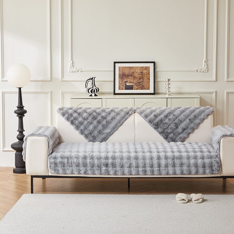 Détail de la texture douce de la housse en fausse fourrure