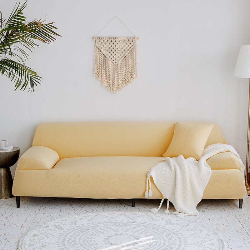 Gros plan sur la housse de canapé, tissu jacquard jaune pâle