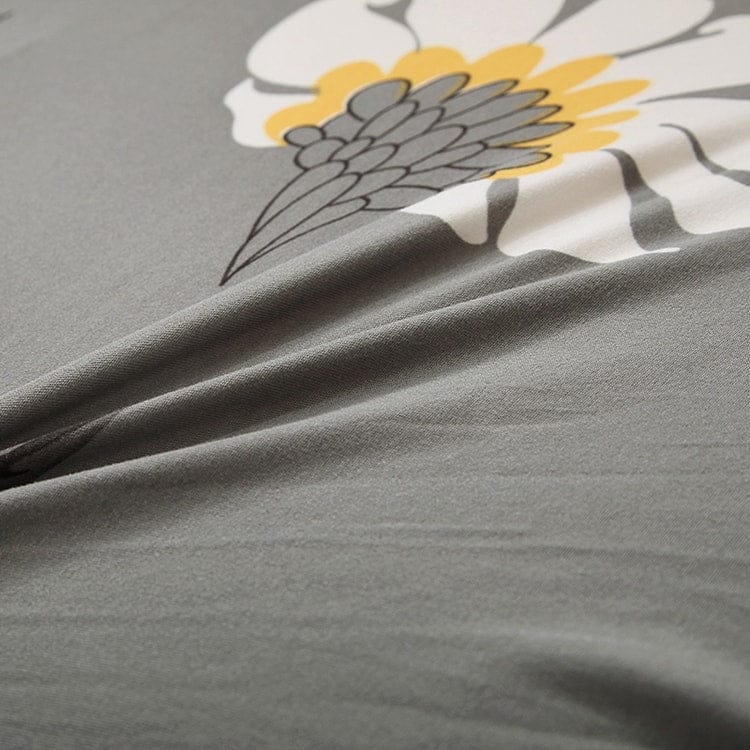 Gros plan sur le tissu extensible et doux de la housse beige