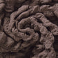 Texture douce et extensible de la housse marron