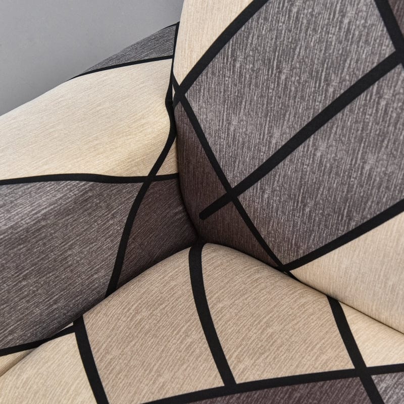 Housse extensible marron sur un canapé d'angle