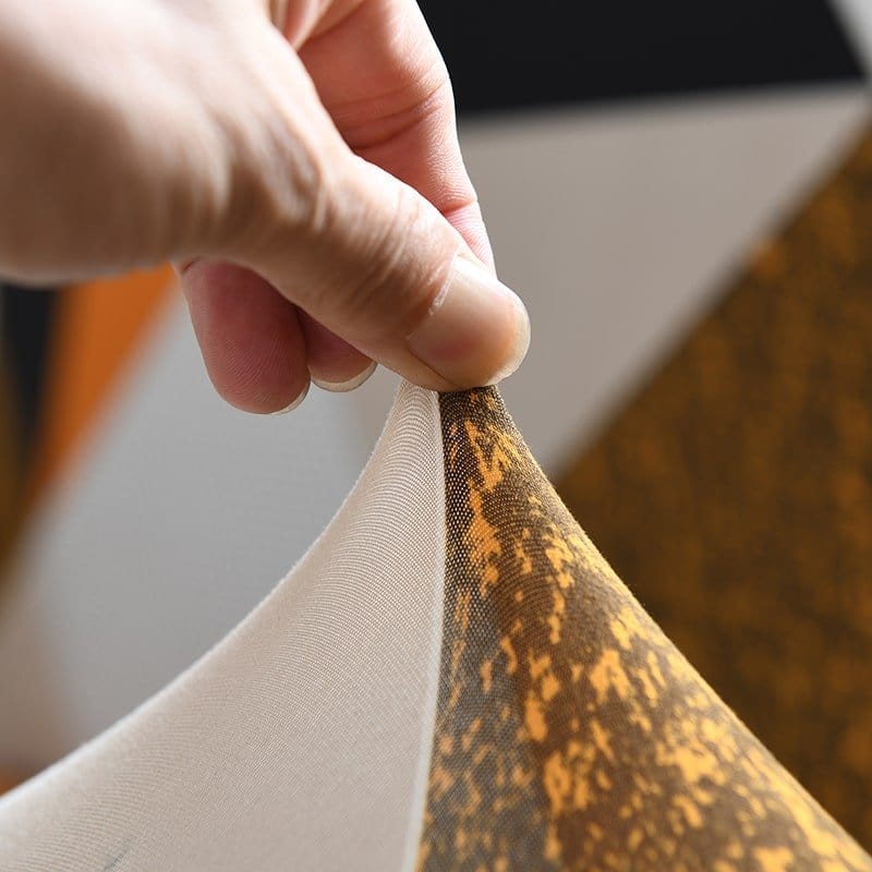 Housse extensible ajustée sur un canapé d'angle