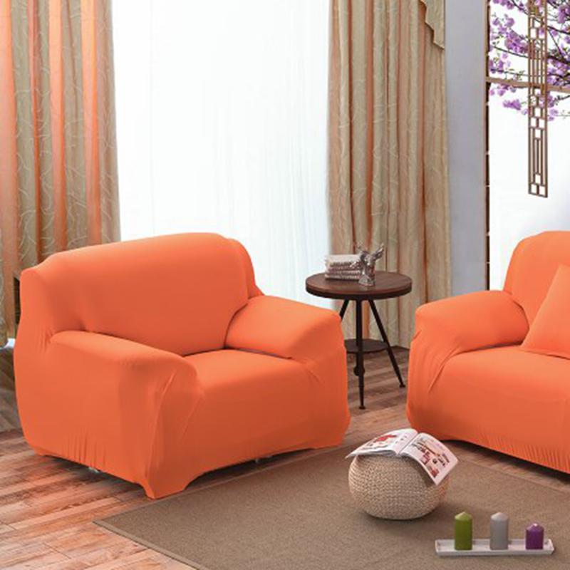 Détail du tissu extensible orange sur un canapé d'angle