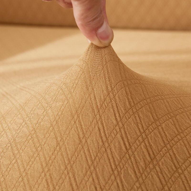 Détail du tissu jacquard orange, texture gaufrée