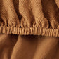 Zoom sur la texture douce et extensible du tissu
