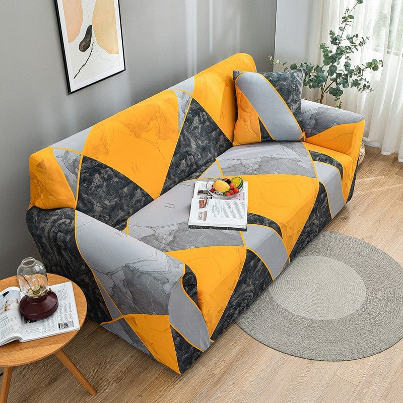 Housse orange ajustée sur canapé d'angle, vue latérale